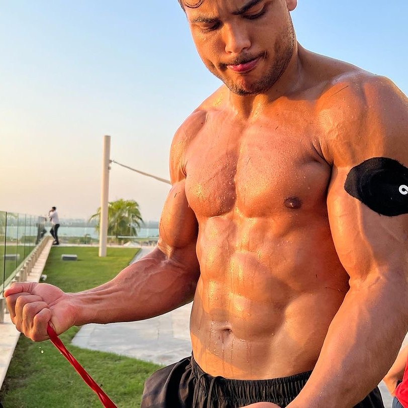 Athlete training outdoors wearing an Ion Layer NAD+ patch on his arm